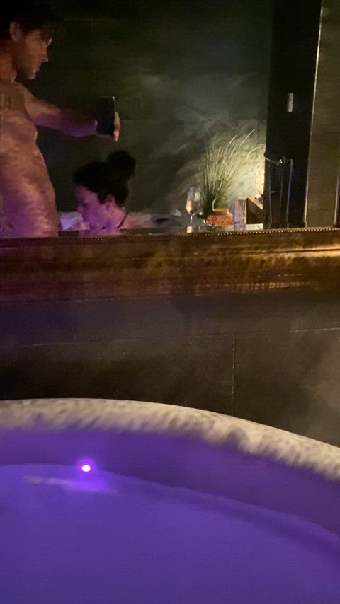 Sucking off the guy she met at the hotel bar in the hottub