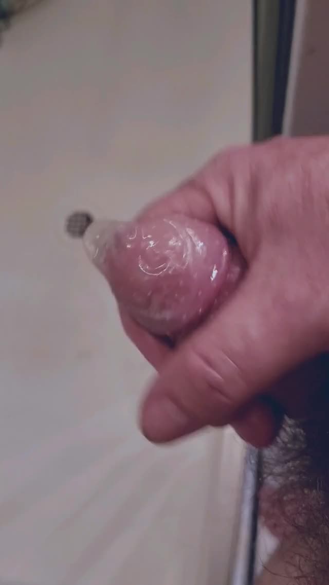 [54] Filling up a condom.