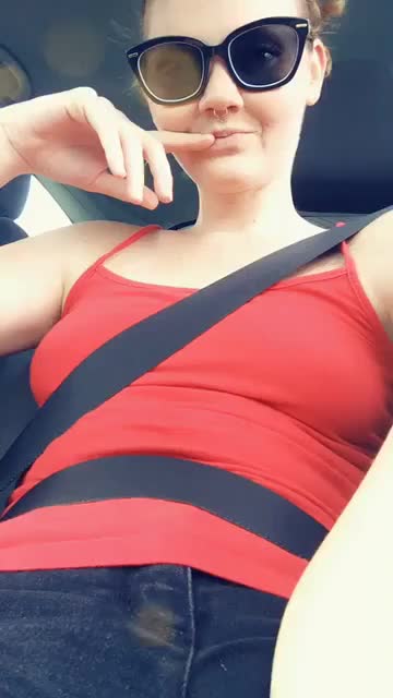 Girl shows her pussy in the car