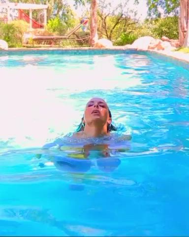 Holly coming out the pool