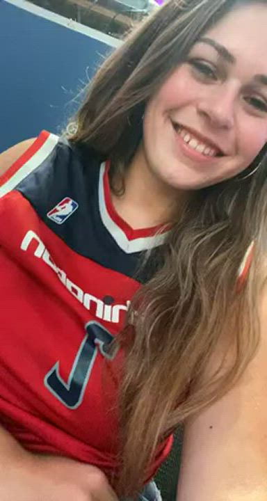 Flashing her huge tits at a basketball game