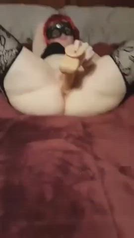 Housewife playing with dildo