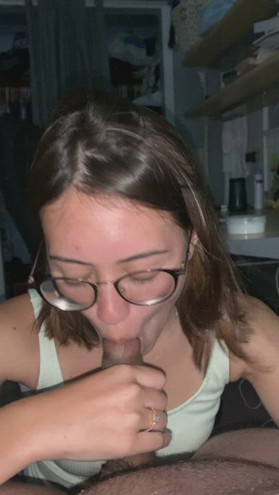 Half Asian in glasses likes to use her tongue