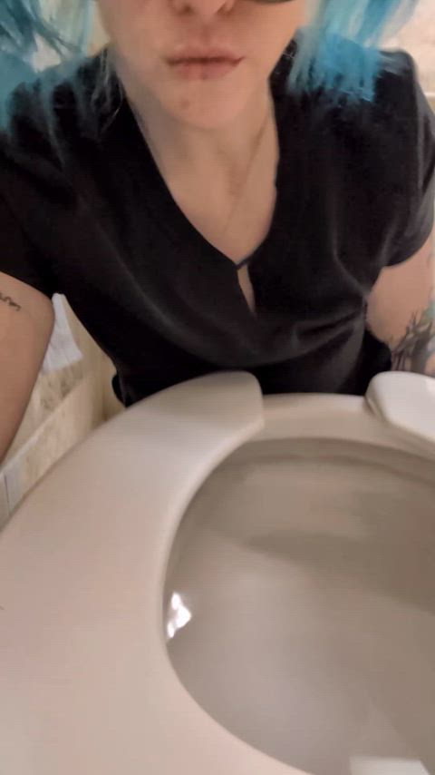 Licking dried piss off the toilet at work
