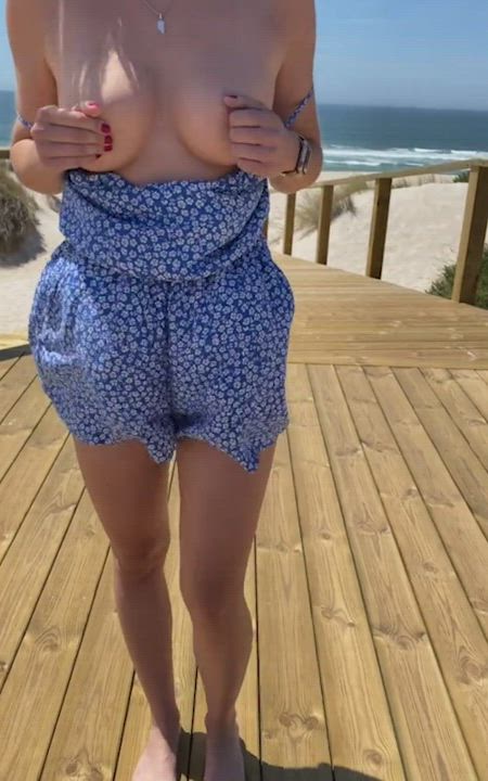 Public handjob with tits out on the beach