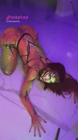 Only wearing fishnet and paint