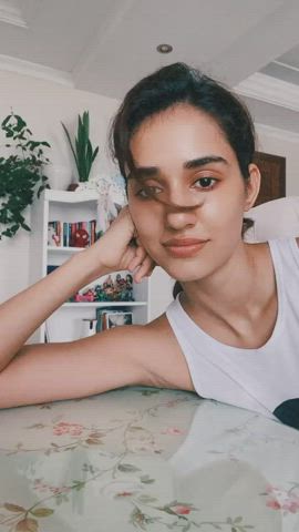 Just a gif of Disha with a happy table.