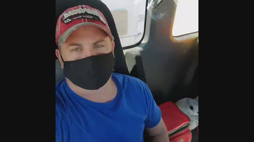 Sitting in his truck