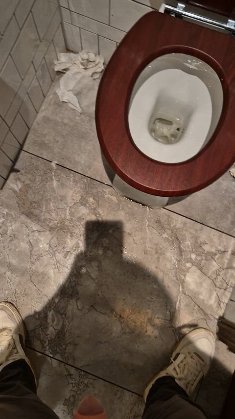 pee peeing piss pissing public toilet gif