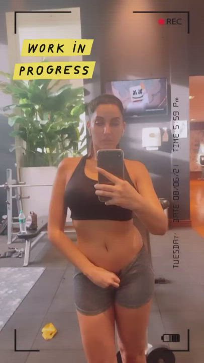 Look at all those tight assets of Nora fatehi makes my dick drool over her every