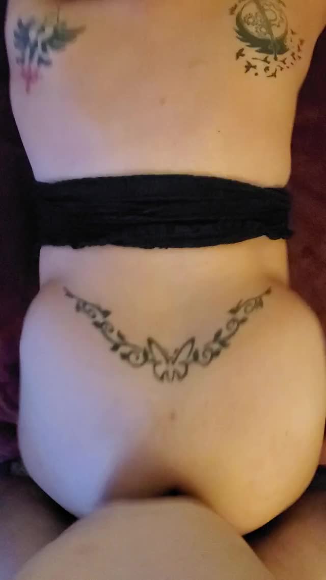 Bent over the bed