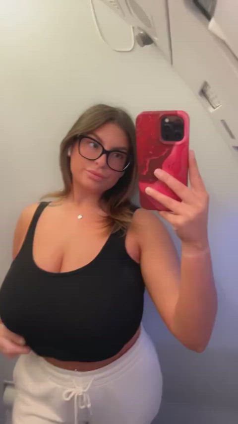 airplane big tits glasses nsfw titty drop gif