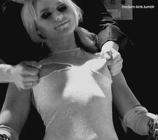 Blonde playing with nipples. Source? Name? Anything??