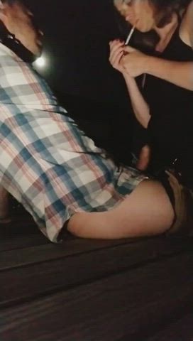 Sharing a cigarette on a public pier while I gently pleasure him