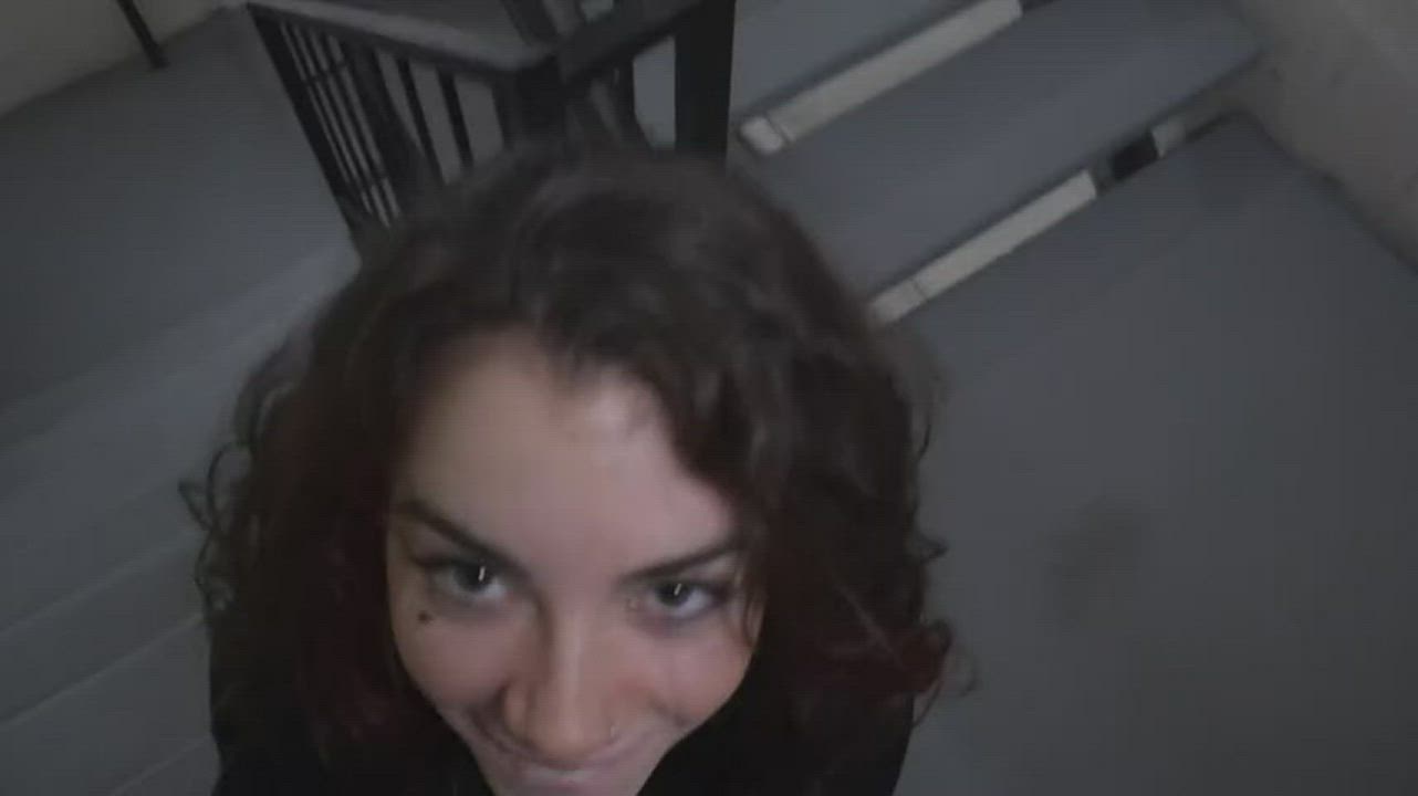 Short hair brunette sucks him off in the stairwell