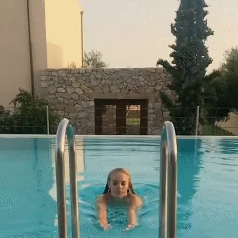 Lucy Rose Jones with a subtle bounce and stretch coming out of the pool