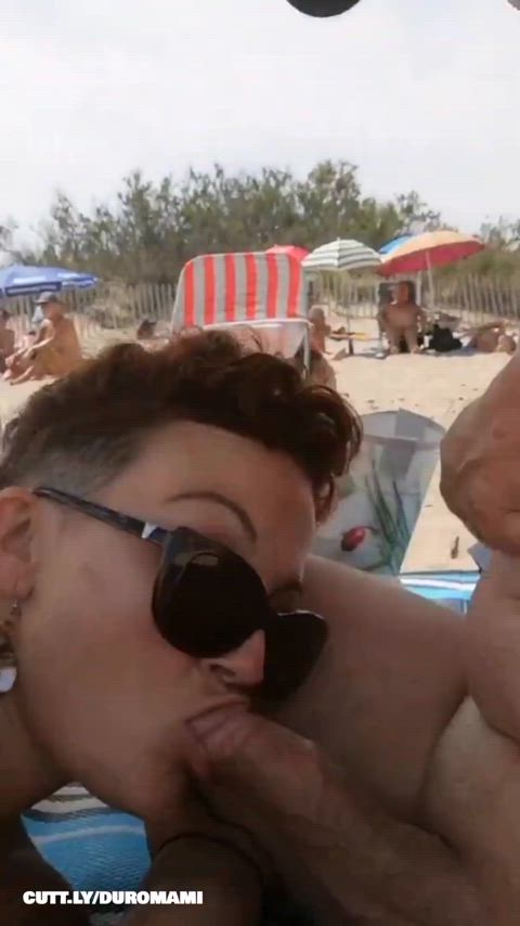 Trashy public beach blowjob