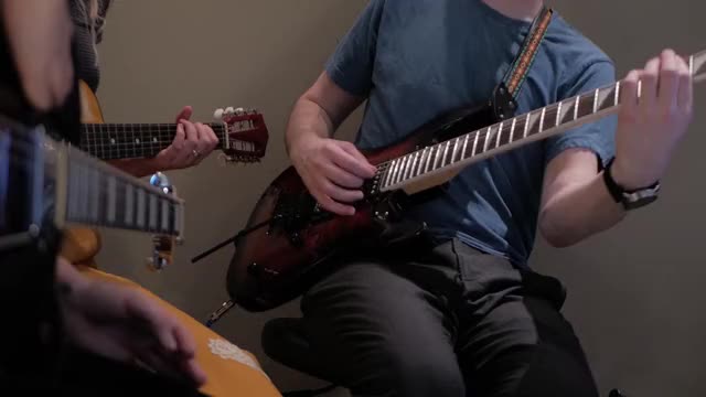 Guitar teacher has an embarrassing wardrobe malfunction!