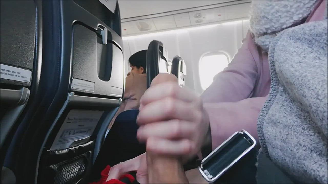 Handjob on an airplane