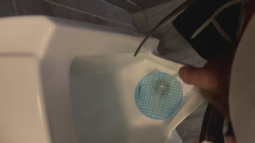 Playing at the urinals