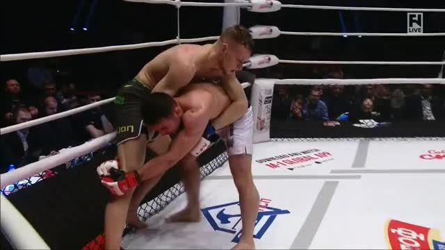 Damien Peltier win a nice rear naked choke in hostile territory at #M1Challenge90