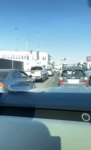 Smokin Hot Blond titty flash in stopped traffic