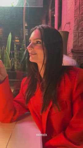 Emily smoking a cigarette