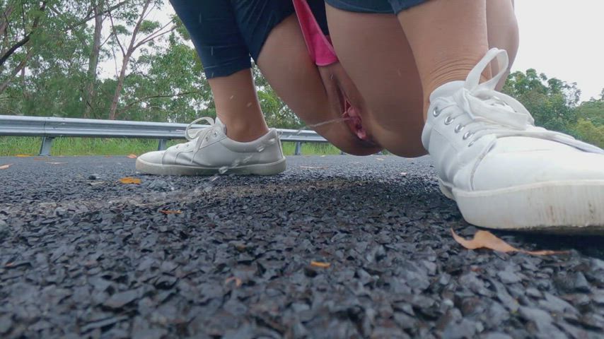 Pissing on the asphalt