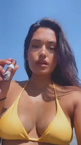 Beauty Indian Cigar Smoking On The Beach