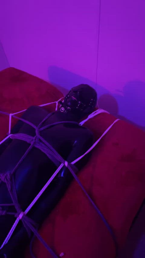 Latex gimp bound to bed and left to struggle