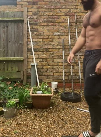 blasian bodybuilder muscles gif