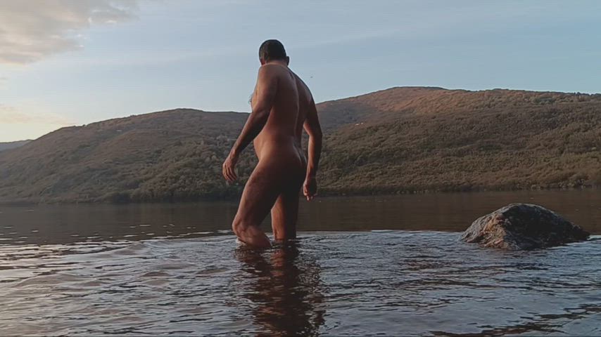 Enjoy the nature. Autumn nudism in the lake
