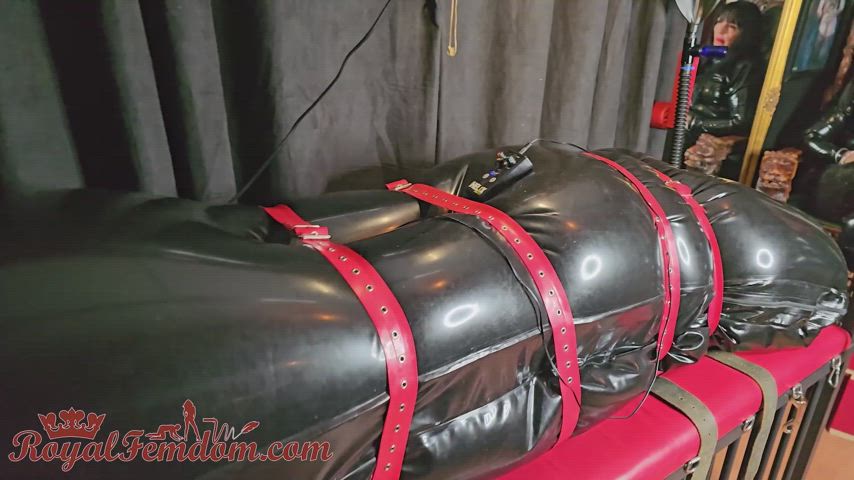 Slave in latex bondage helpless while Mistress Riding her face and spitting in her