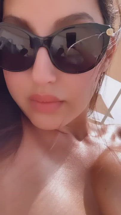 Nora Fatehi Teasing Us With Her Cleavage In a Sexy Bikini