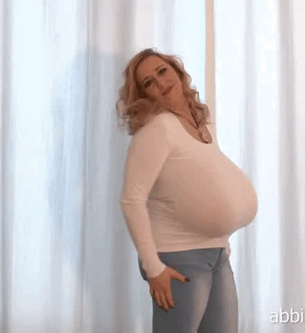 Abbi Secra going braless in a white sweater