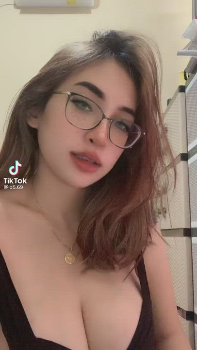 Big tits asian's bra strap slipped