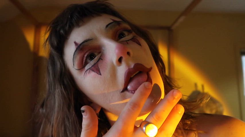 clown girl licking spit spit on face gif