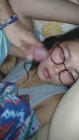 girl with glasses getting a facial