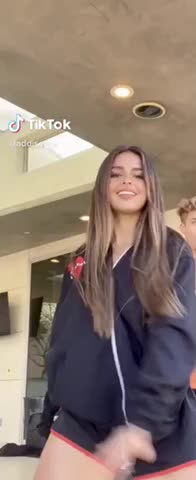 Addison Rae making that ass shake (with the guys mostly cropped)