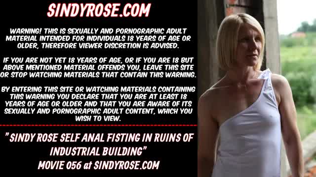 Sindy Rose self anal fisting in the ruins of industral building