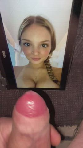 Big eyes and big tits covered in cum. Pic credit: jimfortuna