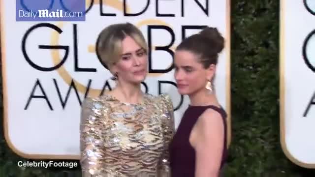 Sealed with a kiss! BFFs Sarah Paulson & Amanda Peet at Globes - Daily Mail
