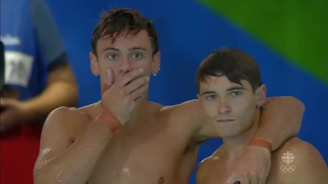 Tom Daley and Daniel Goodfellow celebration hug