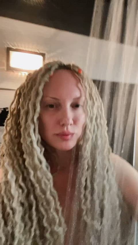 MILF invites you into her shower