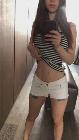 Slim girl showing underwear and flashing boob