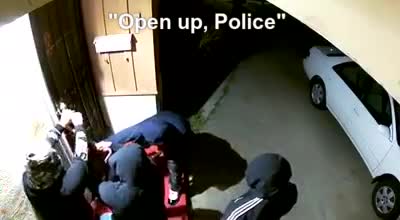 Men breaking into occupied residence
